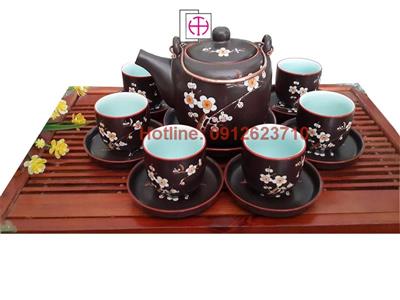 Bộ ấm chén vại men nâu khắc hoa đào